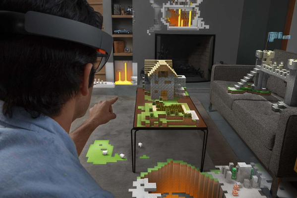 Minecraft being played using Windows 10 and HoloLens. With this help make Microsoft cool with kids? (Image Credit: Microsoft)