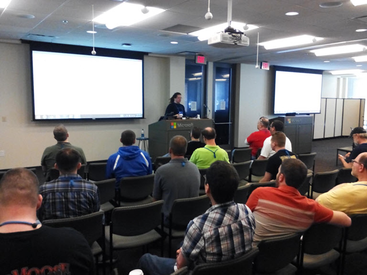 Jim Christopher "hacking" PowerShell at the PowerShell Summit in North America. (Image Credit: Jeff Hicks)