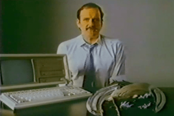 John Cleese compares the Compaq Portable 2 to a dead fish